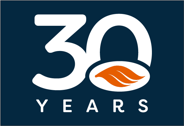 30 years written in white text on a navy background with our orange swoosh in orange overlayed on the bottom half of the 0 in 30. 