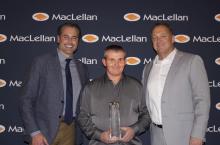Group photo including (left to right) Mike Sausman, Jeremy Conn, and Bill Wilkins with Jeremy holdig his engraved crystal leadership award